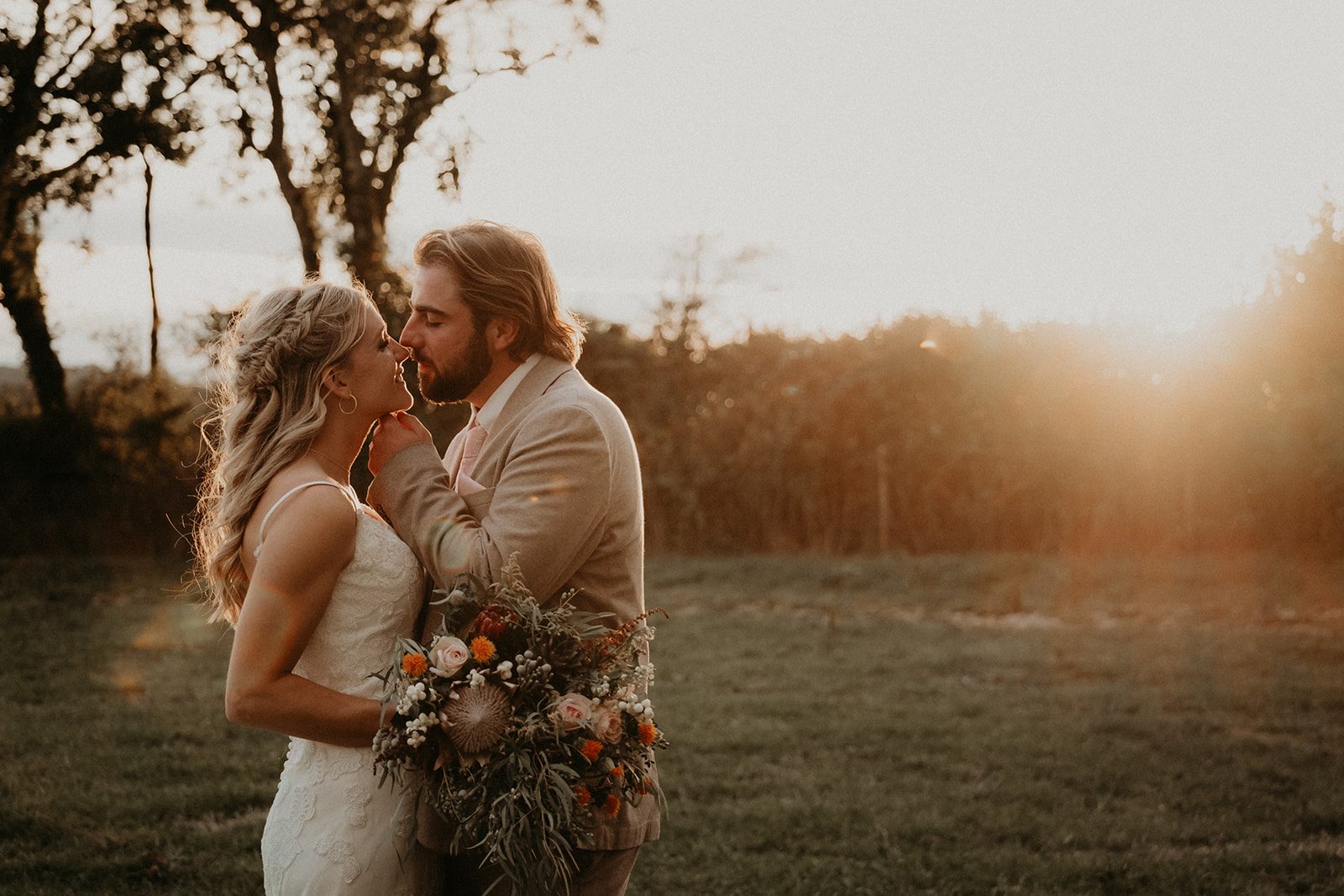 Sally and Harry sharing a kiss in golden sunset light