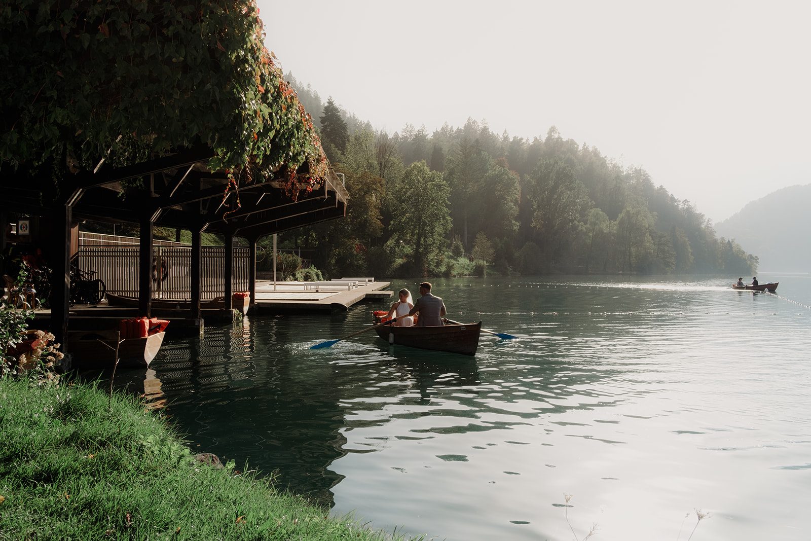 Zoe and Liam in a rowing boat on Lake Bled
